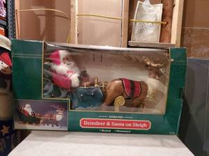 lot 8929 image: Animated Reindeer & Santa on Sleigh