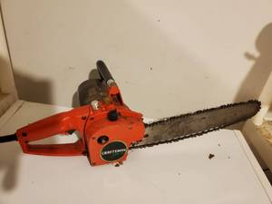 lot 8945 image: Craftsman Electric Chainsaw. with Safety Tested and Working
