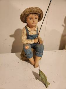 lot 8961 image: Plastic Yard Decor of Fishing Boy