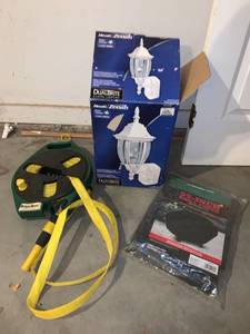 lot 8964 image: 55 Inch Grill Cover Hydro Hose and Zenith Motion Activated Light Location Garage