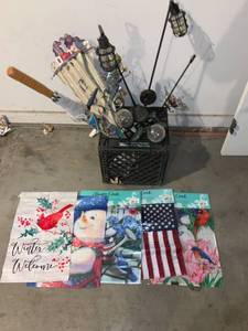 lot 8965 image: Garden Flags and Yard Art Location Garage