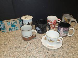 lot 1092 image: Assorted Coffee Mugs and Mug Rug Coasters
