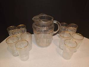lot 1120 image: Gold Tone Rimmed Pitcher and Glasses