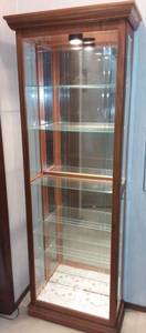 lot 1231 image: Wood and Glass Lighted Curio Cabinet 76 x 27 x 12 in