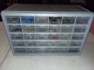 lot 3056 image: Plastic 30 Bin Storage Container with Contents Missing 1 Bin