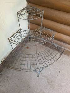 lot 4009 image: Plant Stand Metal Corner Plant Stand. 30 inches tall and approximately 40 inches in diameter