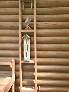 lot 4030 image: Lawn Decor Ladder Shelf x 2 with decor. 80 inches tall and 15 inches wide x 3.5 inches deep