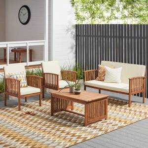 lot 11596 image: Carolina Acacia 4 piece outdoor patio set Brown Patina with Cream Cushions Christopher Knight