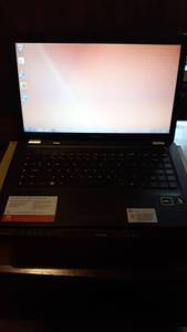 lot 1028 image: Compaq Presario CQ56-115DX