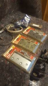 lot 965 image: Lot of Hose Clamps and Door Hinges