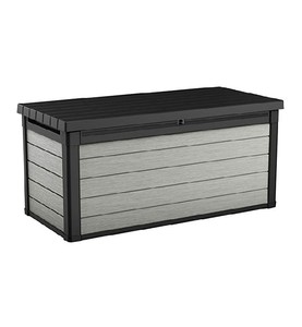 lot 2472 image: Keter Denali 150 Gallon Resin Large Deck Box - Organization and Storage for Patio Furniture, Outdoor Cushions, Garden Tools and Pool Toys, Grey & Black