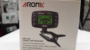 lot 1694 image: Aroma Music Clip-On Tuner AND Metronome