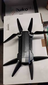 lot 1980 image: Ruko F11 Pro Drone 4K Quadcopter Broken front