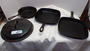 lot 7049 image: CAST IRON SKILLETS AND LID
