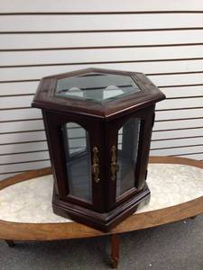 lot 8130 image: glass and wood 6 sided table 24 in tall has one glass shelf