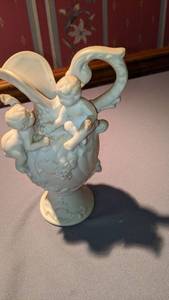 lot 9254 image: babies on pitcher