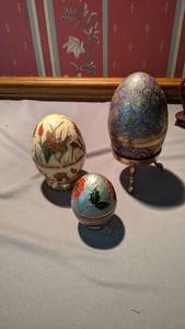 lot 9262 image: three metal decorative eggs