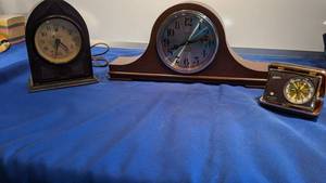lot 9343 image: two manual clocks and alarm clock