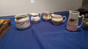 lot 9429 image: five vintage pitchers