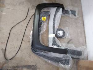 lot 3273 image: Lund SX110T Elite Series Black Sport Style Textured Fender Flare - 4 Piece