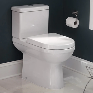 lot 150 image: Miseno Cascade Two-Piece High Efficiency Toilet with Elongated Chair Height Skirted Bowl - Includes Soft Close Seat