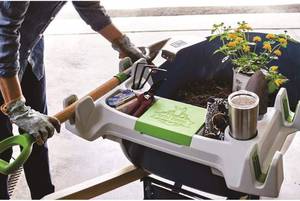 lot 10719 image: The Burro Buddy, USA Made LawnGarden Tray for All 4-6 cu. ft. wheelbarrows. Holds rake, Shovel, Short Handle Tools, Drinks & Water Tight Storage for Phone. Wheelbarrow not Included. Great Gift