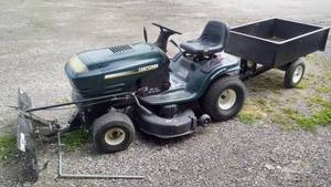 lot 23 image: Craftsman Riding Lawnmower with Snow Plow, Trailer, and Tire Chains
