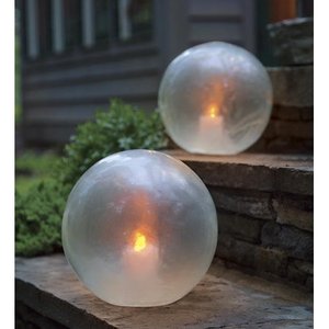 lot 405 image: Glowing Clear Resin Globe