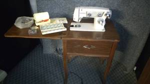 lot 7302 image: Elgin Model 2468 Sewing Machine in Cabinet