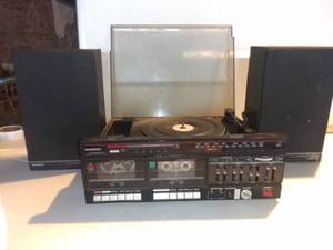 lot 25 image: Vintage Magnavox Dual Cassette, Radio And Record Player With Two Speakers Tested And Working