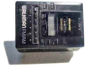 lot 27 image: Vintage Sony Cassette, Radio Walkman With Earphones
