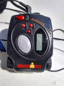 lot 29 image: Vintage Iron Man Triathlon Armband Radio With Earphones