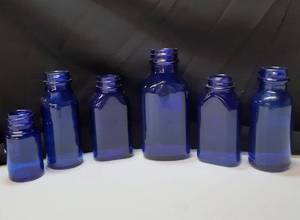 lot 3214 image: Lot of 6 Colbalt Glass Medicine Bottles