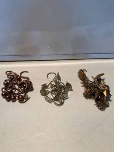 lot 6880 image: Three Sets of Shower Hooks Location Shelf E