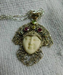 lot 5009 image: Carved Bone Face wGemstones