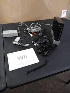 lot 1663 image: wii game system set with cord