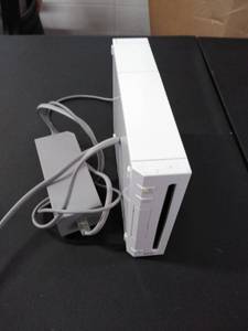 lot 1666 image: wii console with poet cord