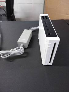 lot 1670 image: wii console with cord