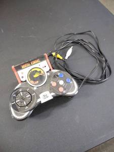 lot 1679 image: mortal Kombat controller