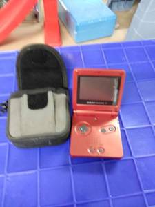 lot 1689 image: Gameboy advance Nintendo red no cord with case