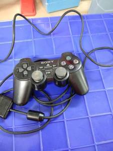 lot 1704 image: Sony playstation controller black with cord