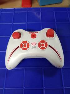 lot 1711 image: Suma controller white and red no cord