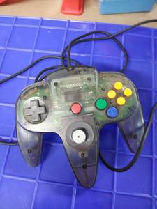 lot 1712 image: Nintendo controller clear with corf