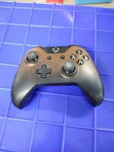 lot 1715 image: Xbox controller brown no back no cord