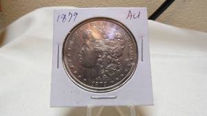 lot 7141 image: 1879 MORGAN SILVER DOLLAR - AU
