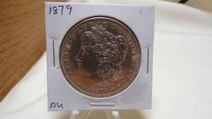 lot 7142 image: 1879 MORGAN SILVER DOLLAR - AU