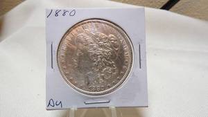 lot 7146 image: 1880 MORGAN SILVER DOLLAR - AU
