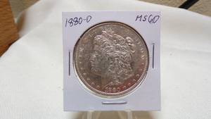 lot 7147 image: 1880-O MORGAN SILVER DOLLAR - MS60