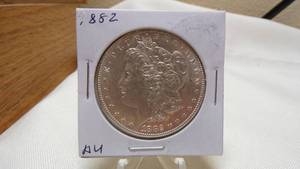 lot 7153 image: 1882 MORGAN SILVER DOLLAR - AU