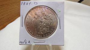 lot 7156 image: 1884-O  MORGAN SILVER DOLLAR - MS62